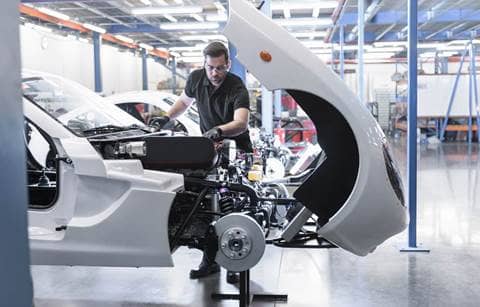 Factory worker in an automotive factory.