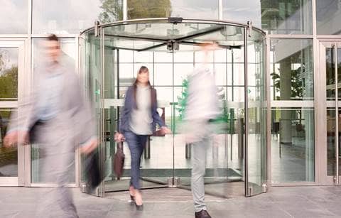 motion image of people leaving office space