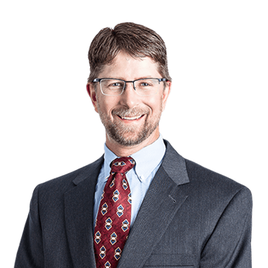Headshot of Lawrence Knutson